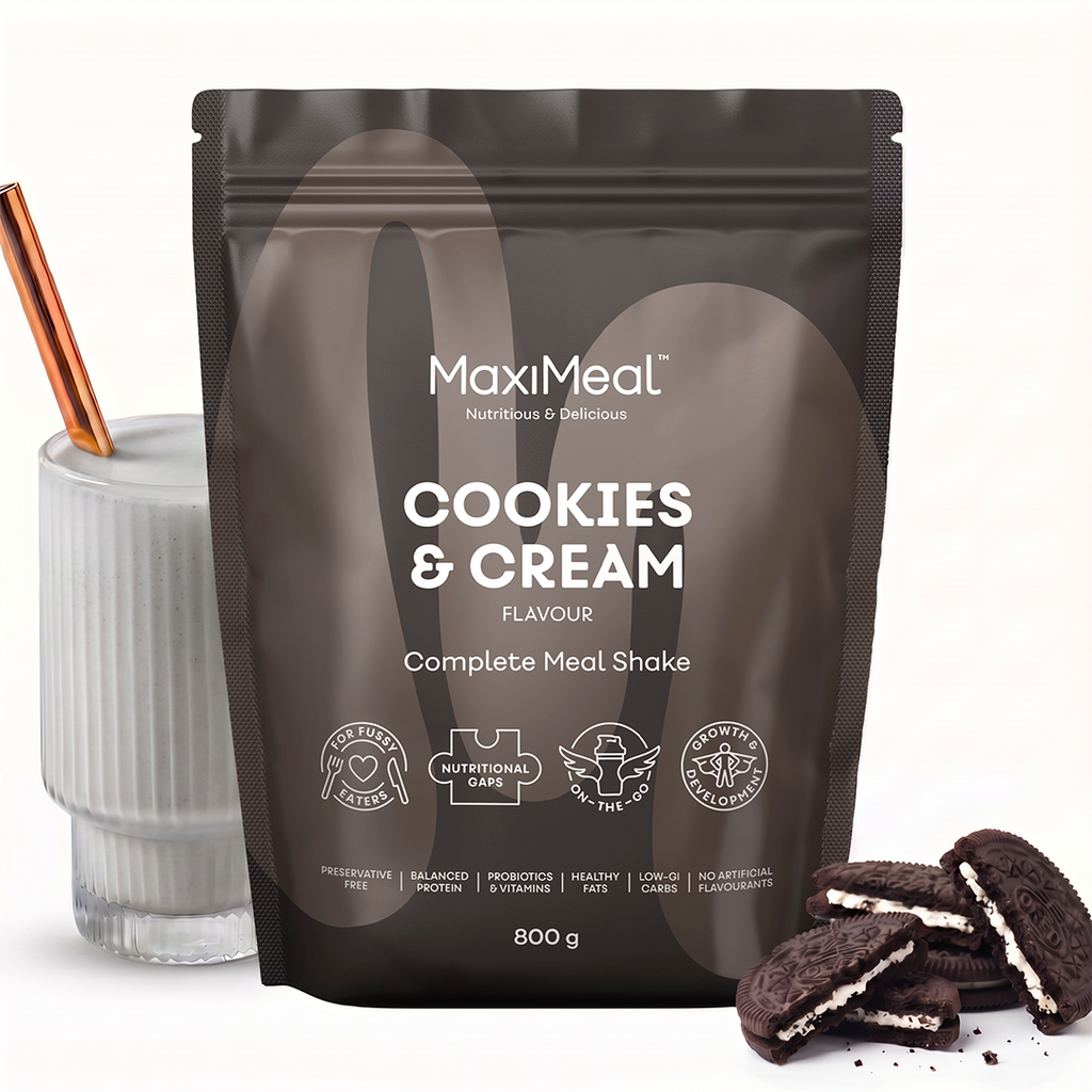 MaxiMeal Cookies & Cream complete meal shake 800g pouch styled with a creamy shake in a ribbed glass and chocolate sandwich cookies, showing the flavour profile and ready-to-drink result, non-GMO, maltodextrin free, no artificial sweeteners, preservative free with balanced protein, probiotics, vitamins, healthy fats, low GI, and no artificial flavourings.
