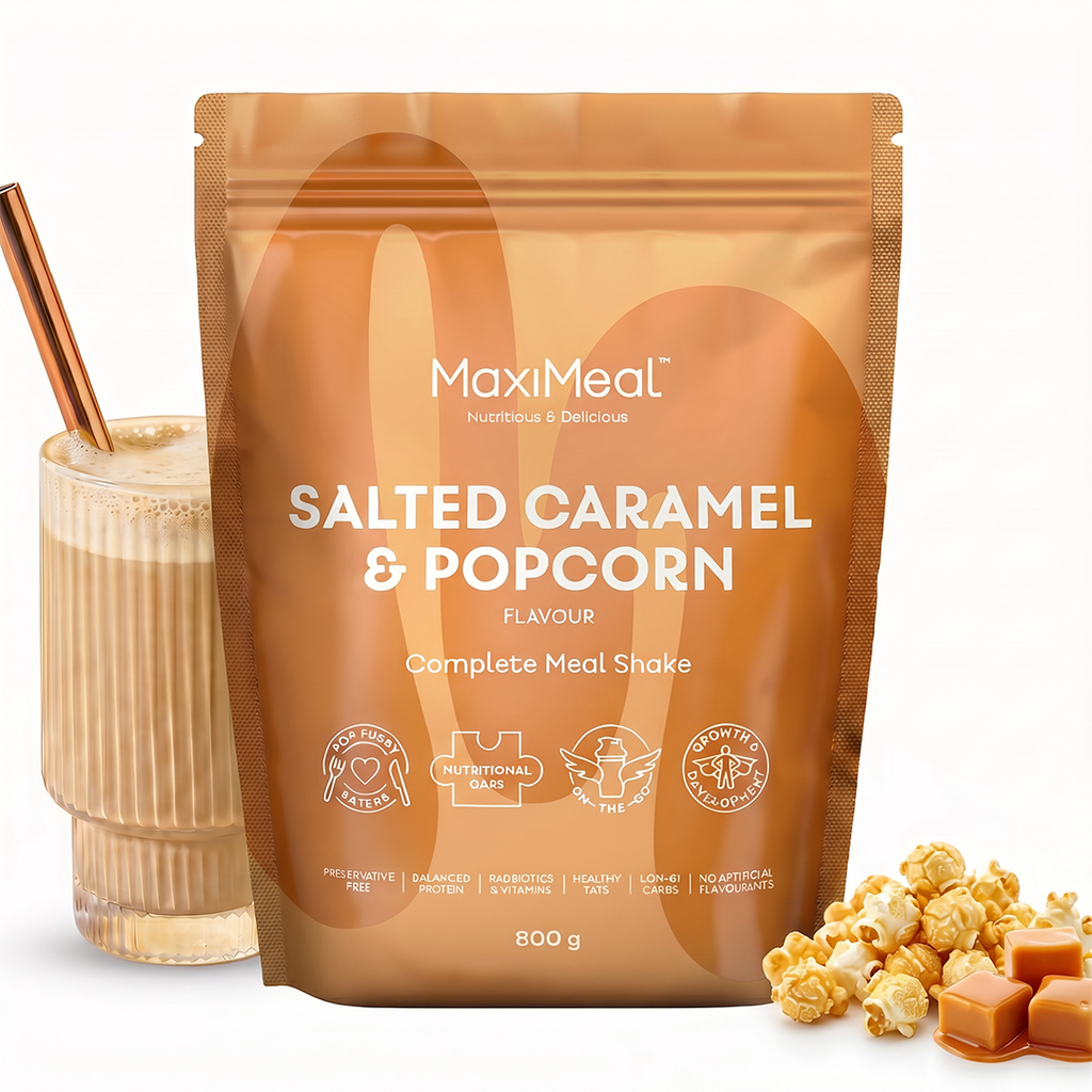 MaxiMeal Salted Caramel and Popcorn complete meal shake 800g pouch styled with a caramel shake in a ribbed glass and salted caramel popcorn pieces, showing the flavour profile and ready-to-drink result, non-GMO, maltodextrin free, no artificial sweeteners, preservative free with balanced protein, pro